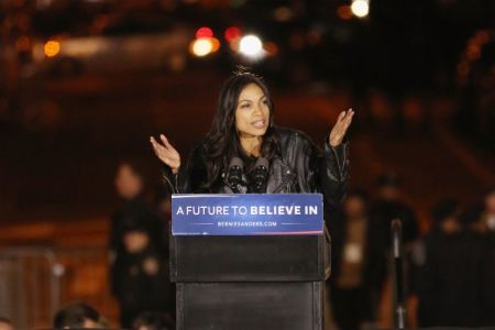 Rosario Dawson giving a speech in Sander's political rally. 